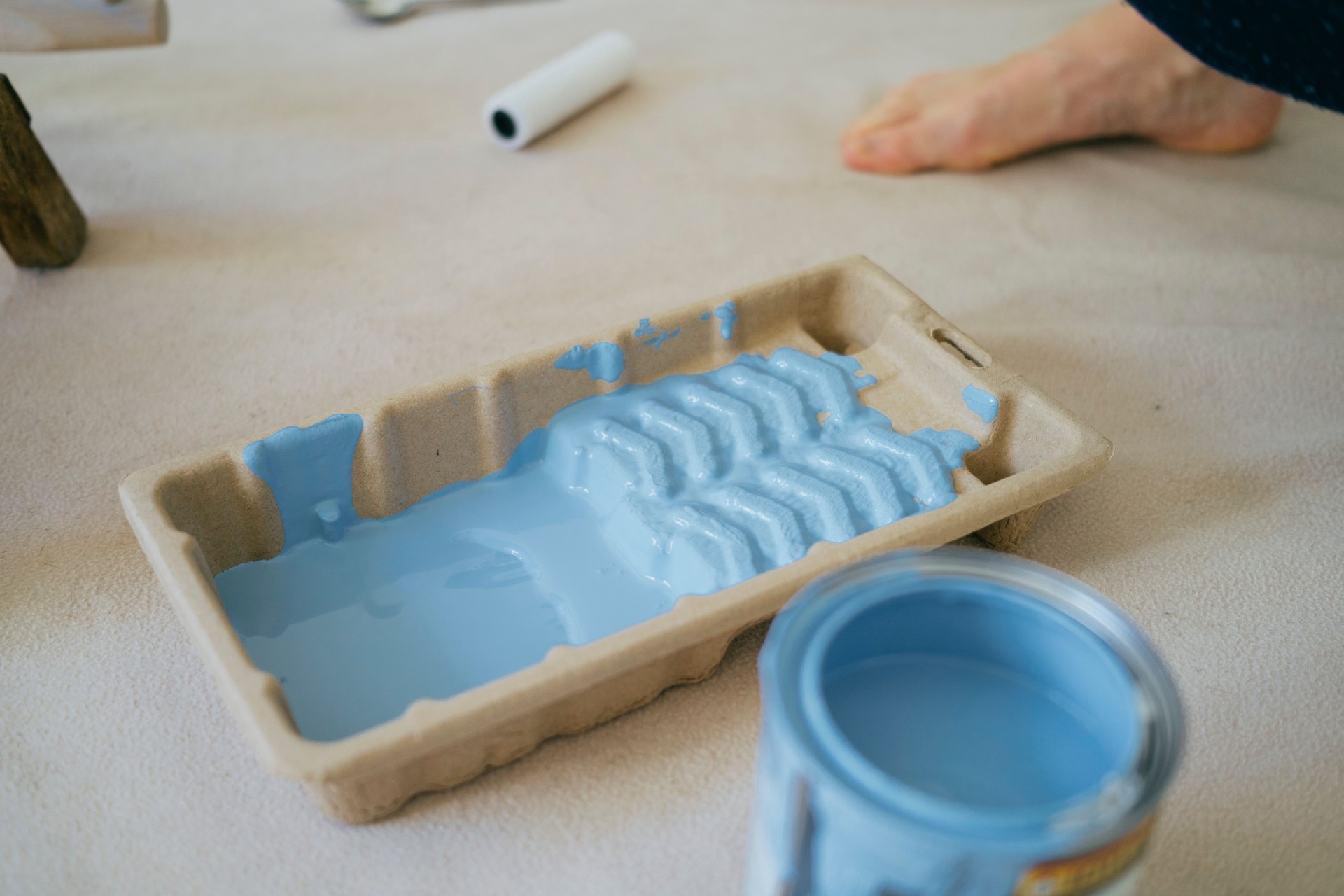 Paint tray and paint can with blue paint