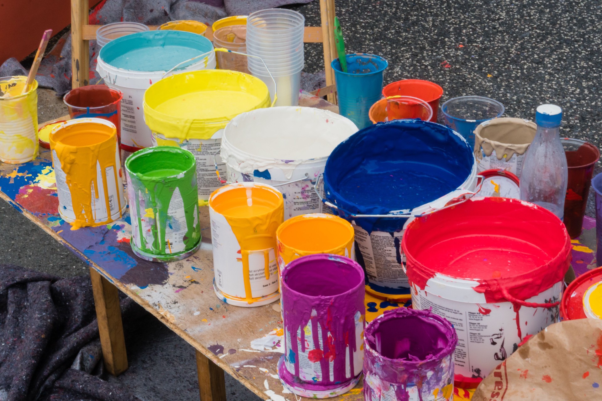 colored cans open on a table
